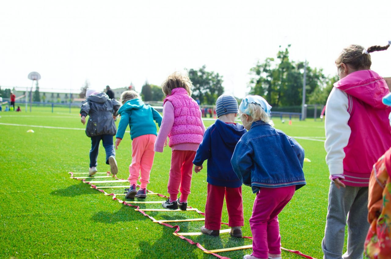 Group of children playing outside.