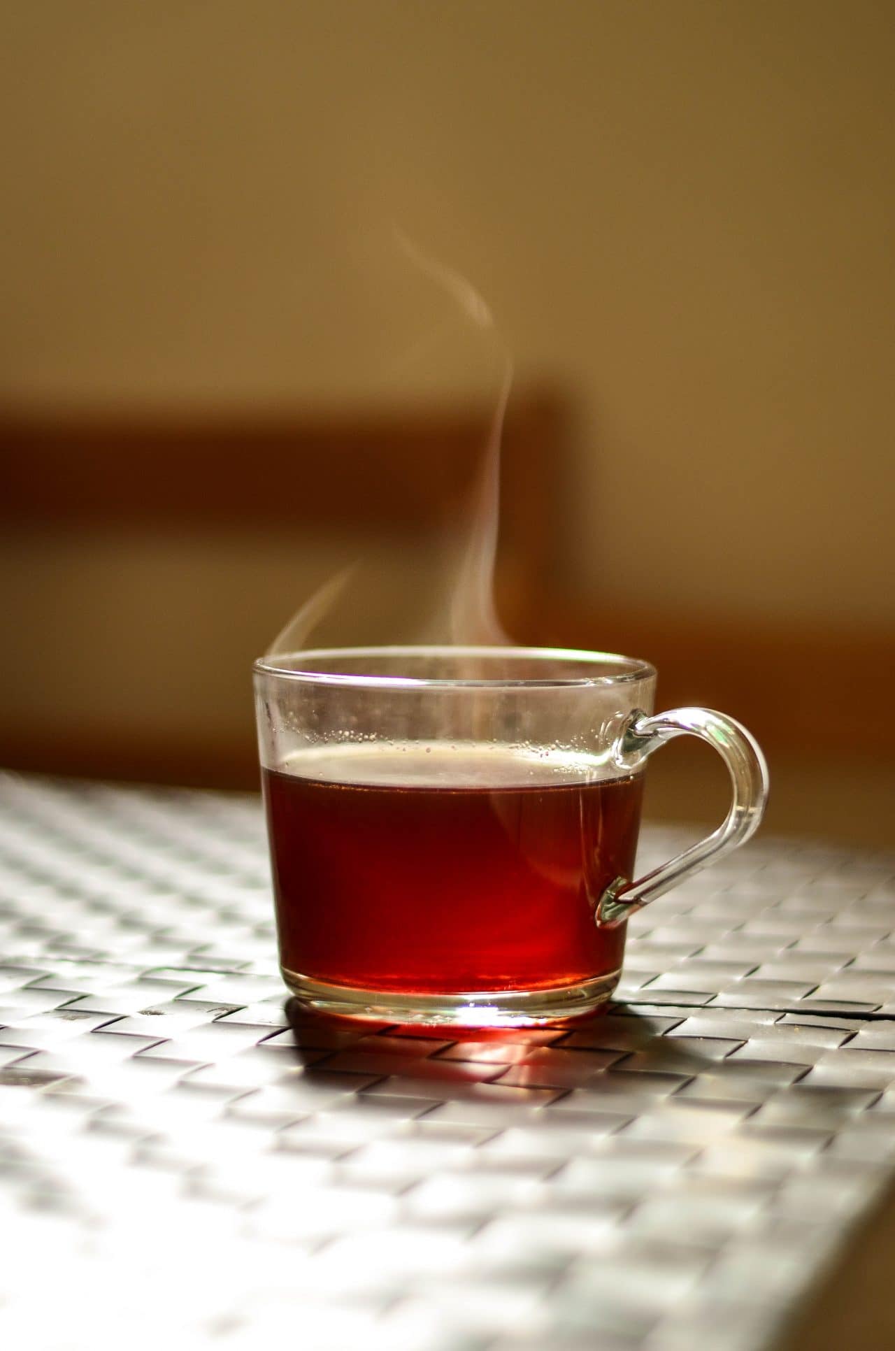A cup of tea on a counter.