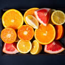 Collection of cut up citrus fruits